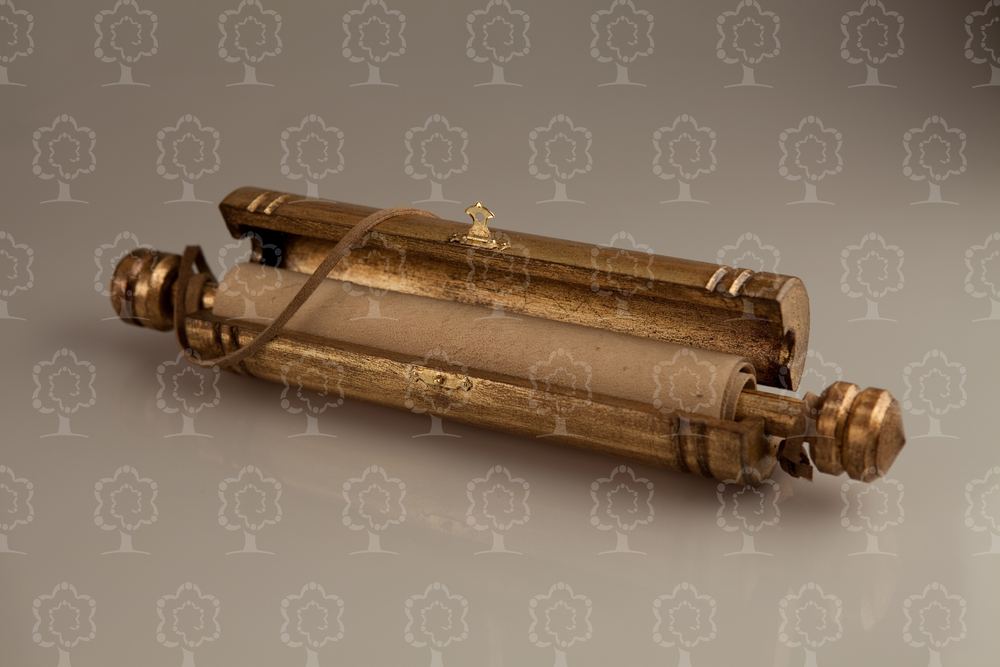 Luxe gift certificate — a leather scroll in a handmade wooden tube with gilded fittings